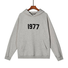 FEAR OF GOD ESSENTIALS 1977 SWEATER