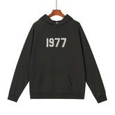 FEAR OF GOD ESSENTIALS 1977 SWEATER