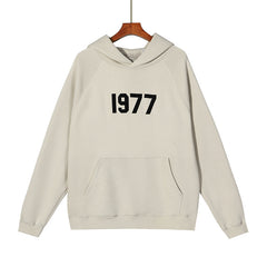 FEAR OF GOD ESSENTIALS 1977 SWEATER