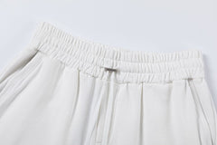 AMIRI logo-embellished cotton track Shorts