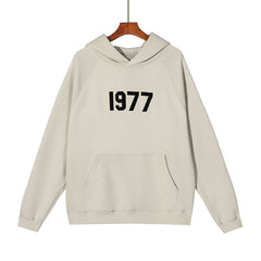 FEAR OF GOD ESSENTIALS 1977 SWEATER