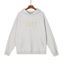 FEAR OF GOD ESSENTIALS 1977 SWEATER